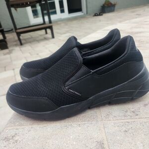 Skechers Men's Relaxed Fit slip-on shoes featuring Air-Cooled Memory Foam insole